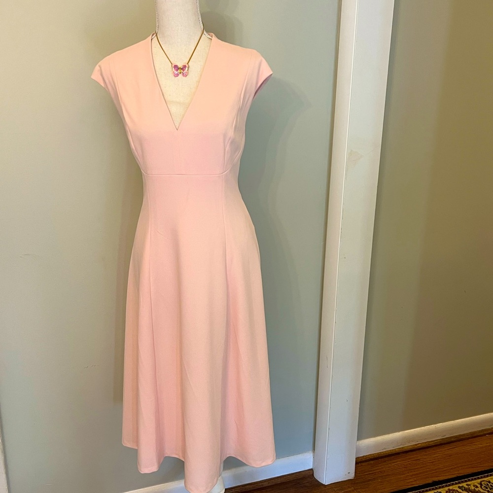 Stunning soft pink sleeveless lined v-neck Tommy Hilfiger dress.